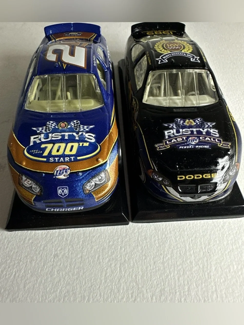 Two Rusty Wallace #2 1/64 diecast 1 blue rusty 700th Start And 1 Last Call
